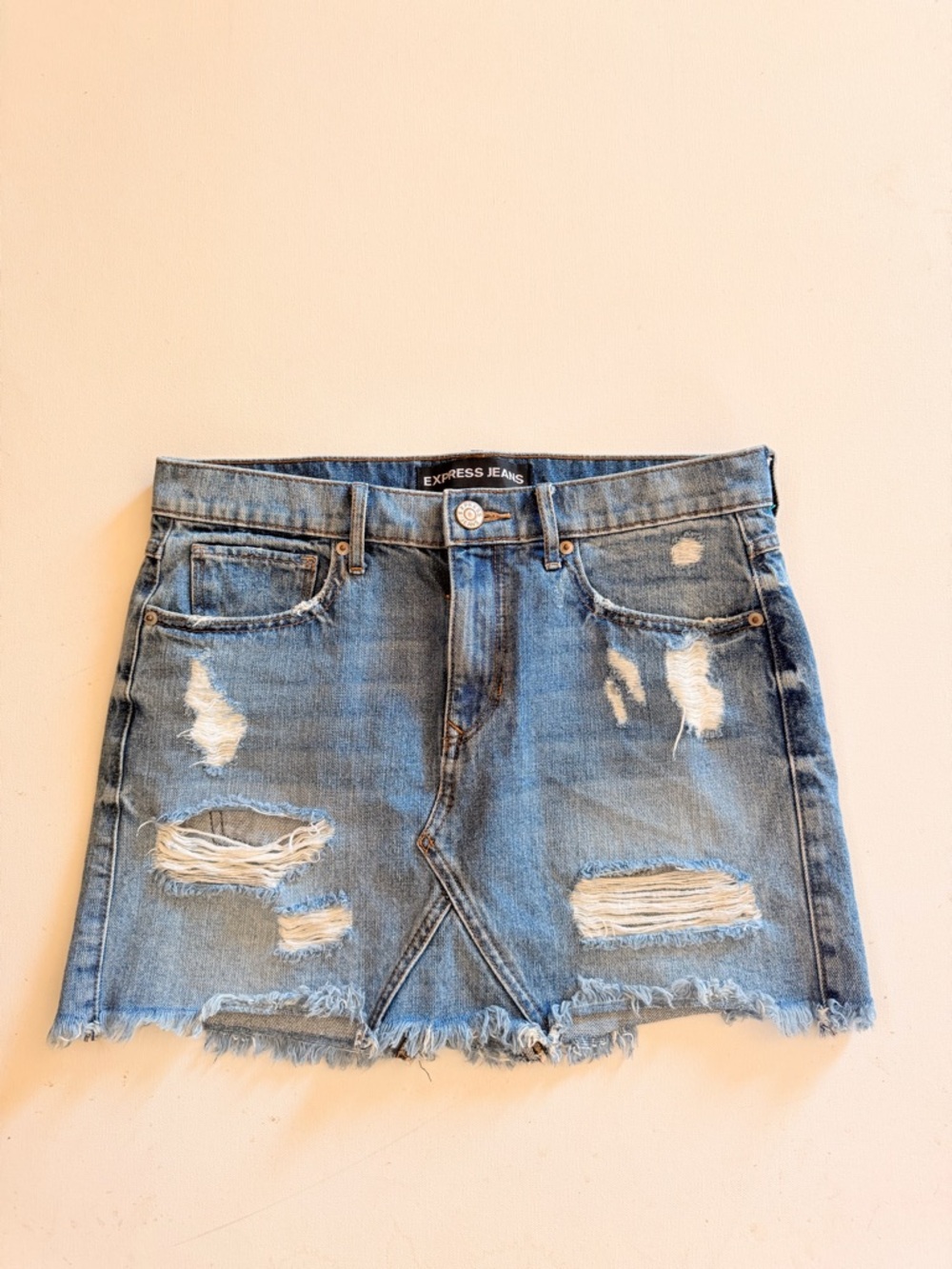 Express Jeans distressed mini Jean skirt